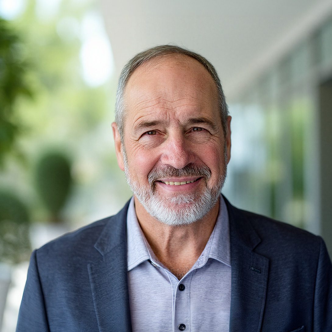 James Merrifield managing partner at MPV Properties mature man with beard and a sports coat smiling inside
