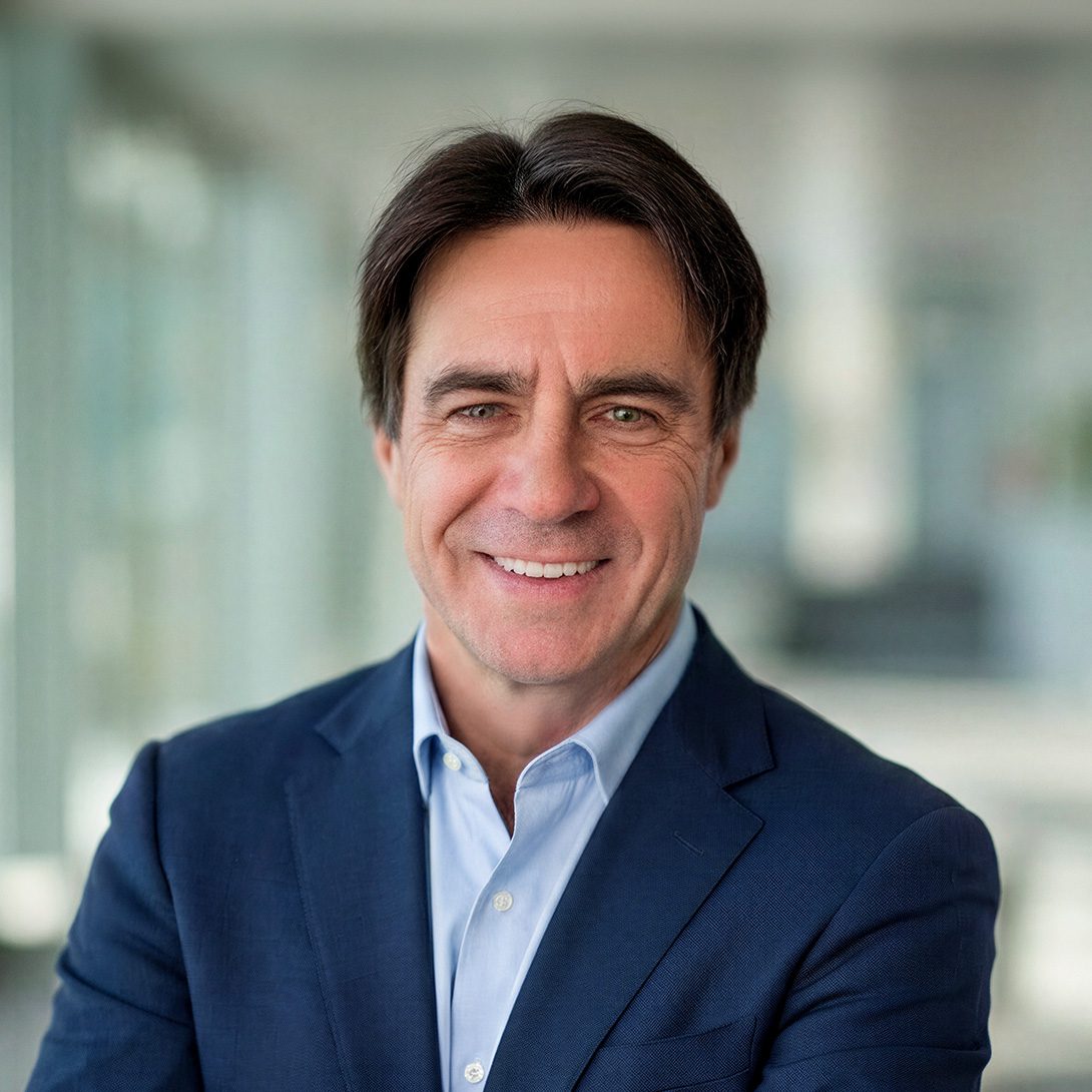 Mike Bilodeau development partner businessman smiling inside an office