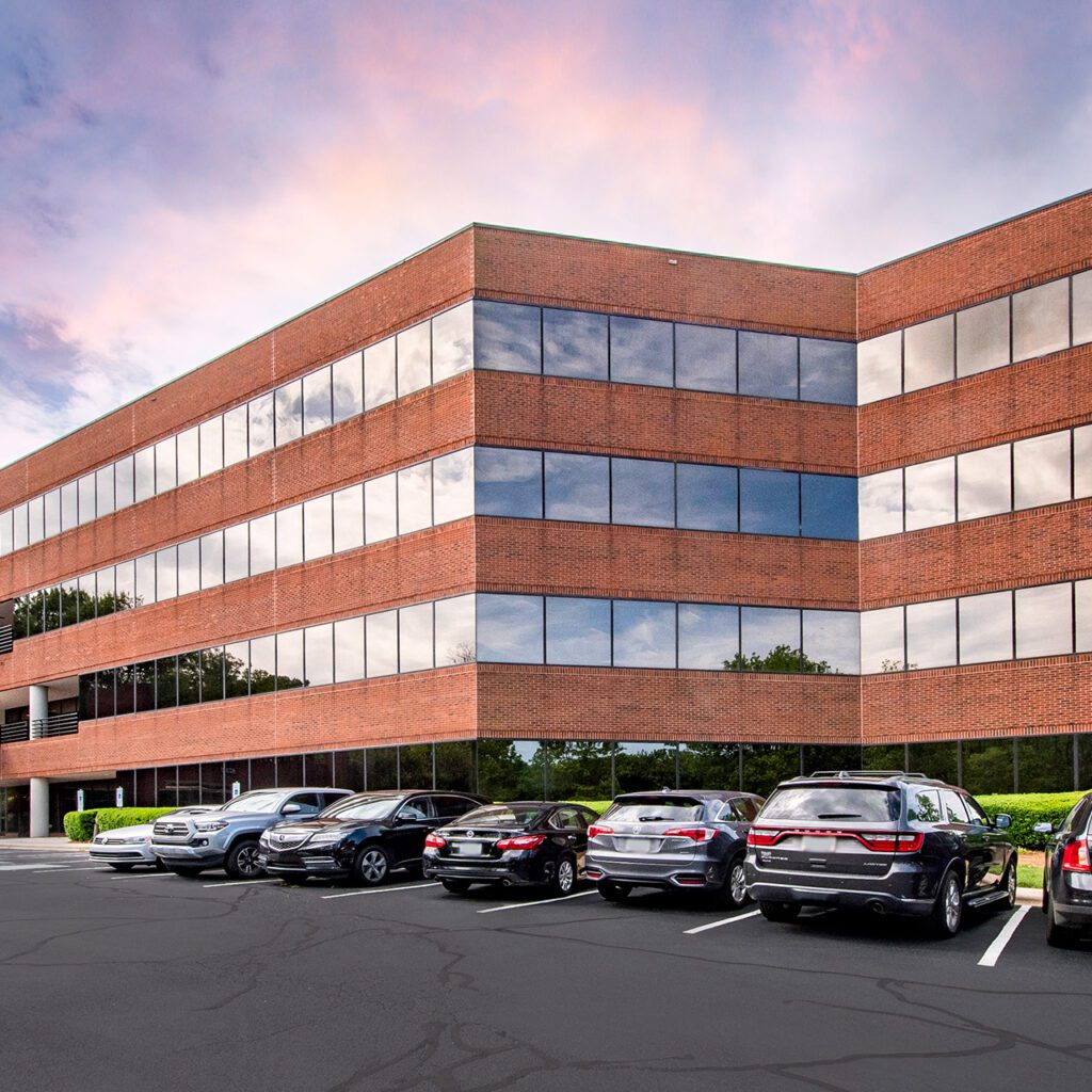 South Charlotte Water Oak building in Oak Hill Business Park 4-story brick and glass office building