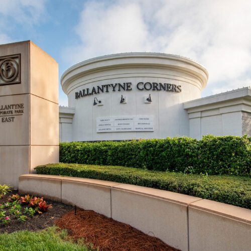 Ballantyne Corners image of main building and monument in front