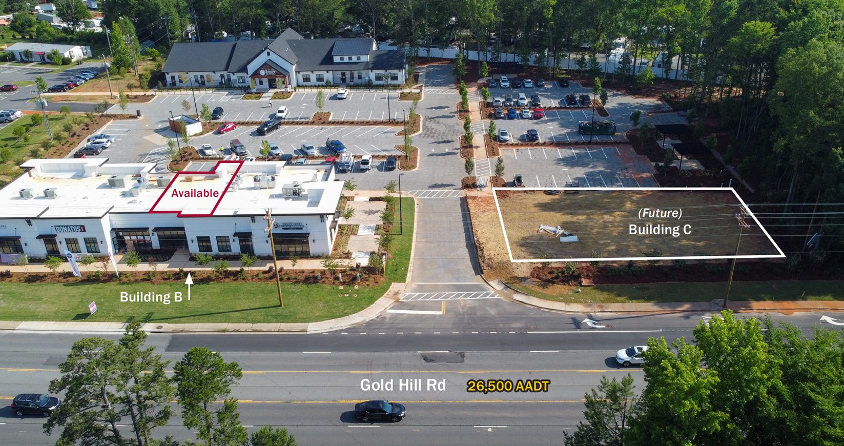 Aerial drone photograph of white commercial building