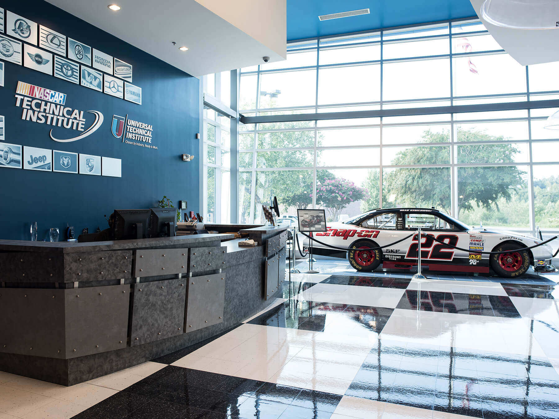 NASCAR-Technical-Institute-interior lobby showroom with counter and one racecar