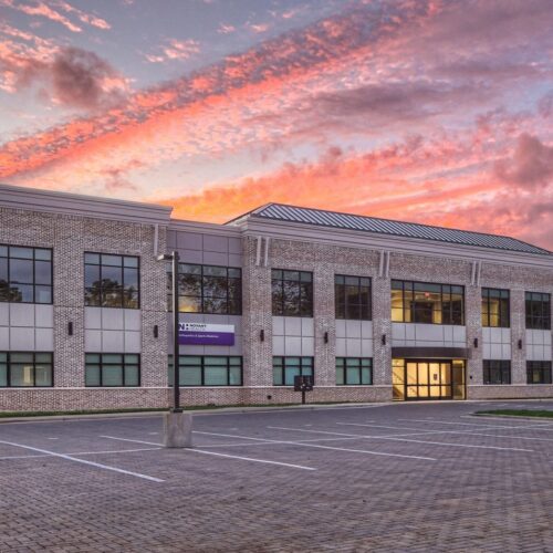 Cotswold Medical office building Exterior shot at sunset by Shelco