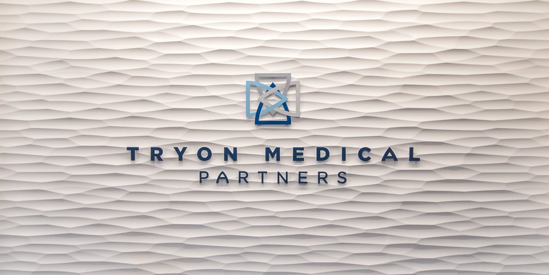 Marvin-Crossing-Tryon-Medical-Partners-sign white textured