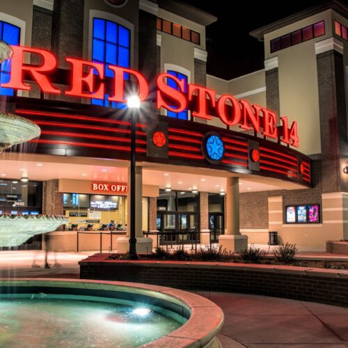 RedStone theater exterior evening with fountain