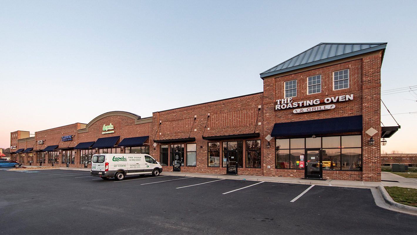 Gold Hill Crossing one story red brick retail building