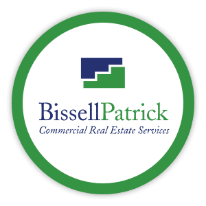 Bissell Patrick logo inside green circle