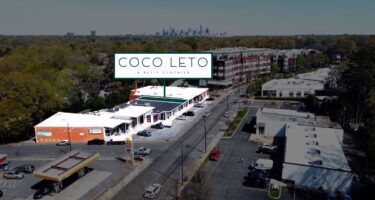 Coco Leto store highlighted in aerial of shop buildings on Colony Road