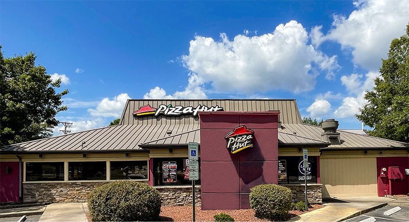 Durham Pizza Hut OM Exterior with Blue Skies