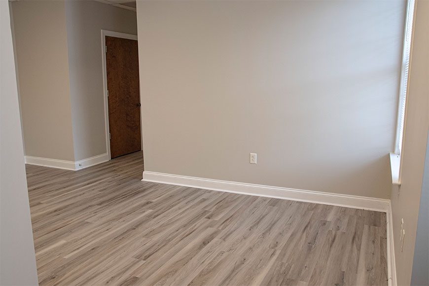Office with Grey Wood Floors