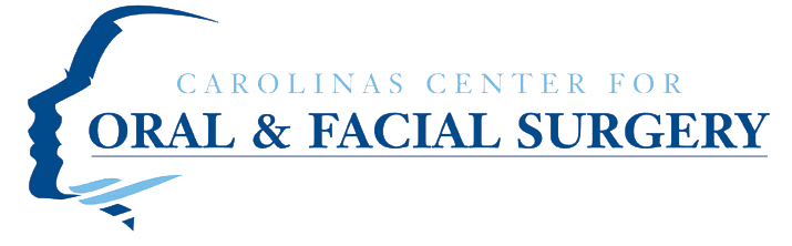 Carolinas Centers for Oral & Facial Surgery logo blue with face profile