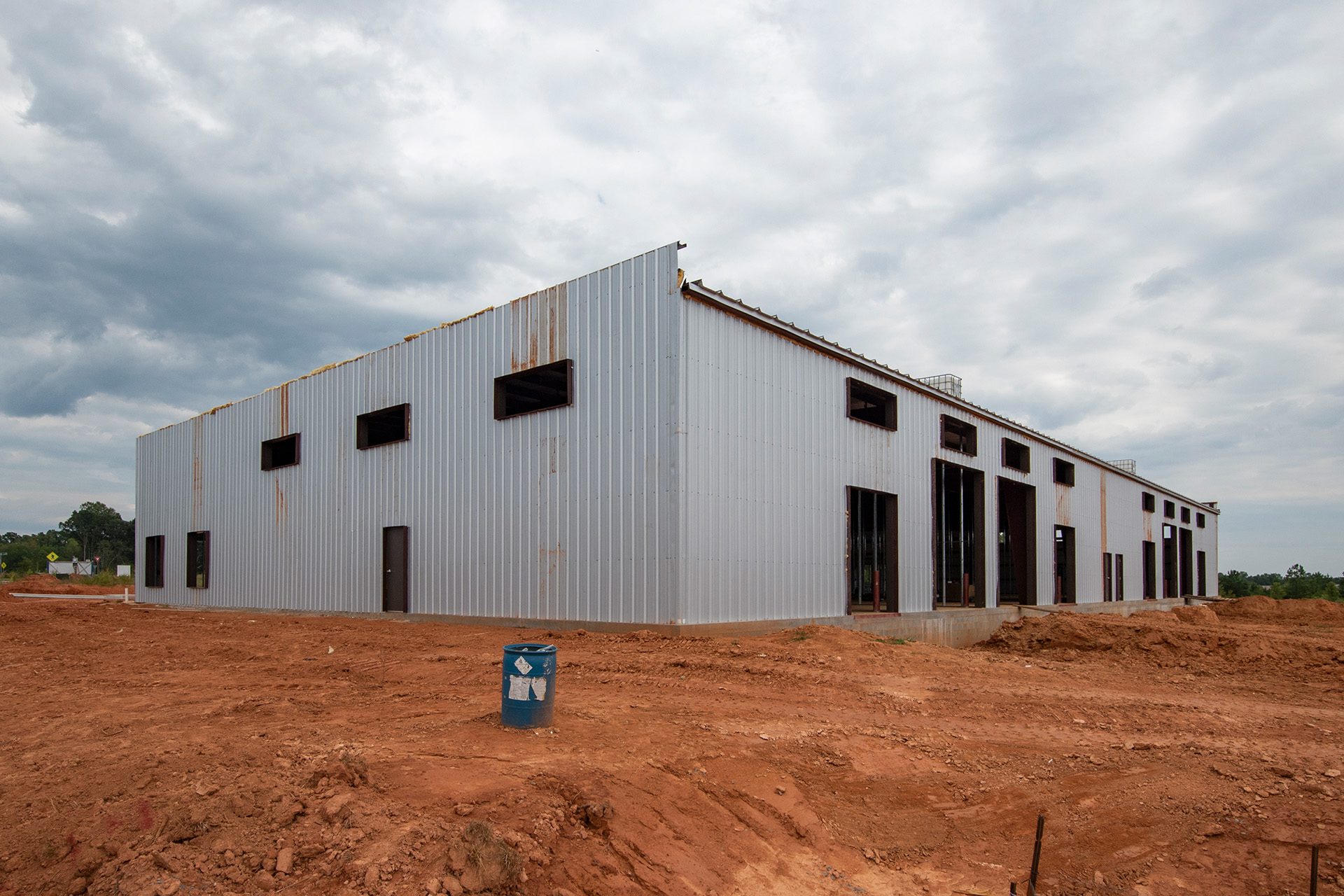 industrial flex building under construction with corrugated steel on outside of building