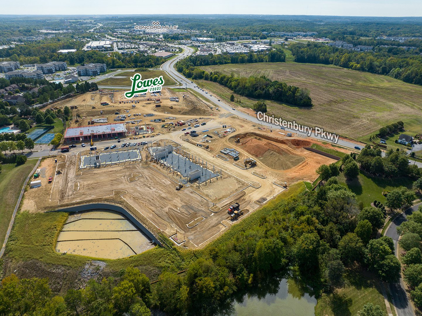 aerial image of construction at Christenbury Village with Concord Mills in the background