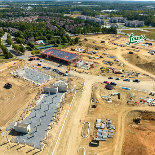 aerial image of construction at Christenbury Village with 3 building pads progressing