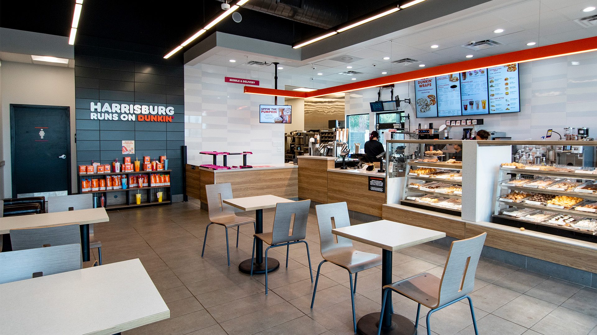 Dunkin' at Farmington interior with clean white walls and seating