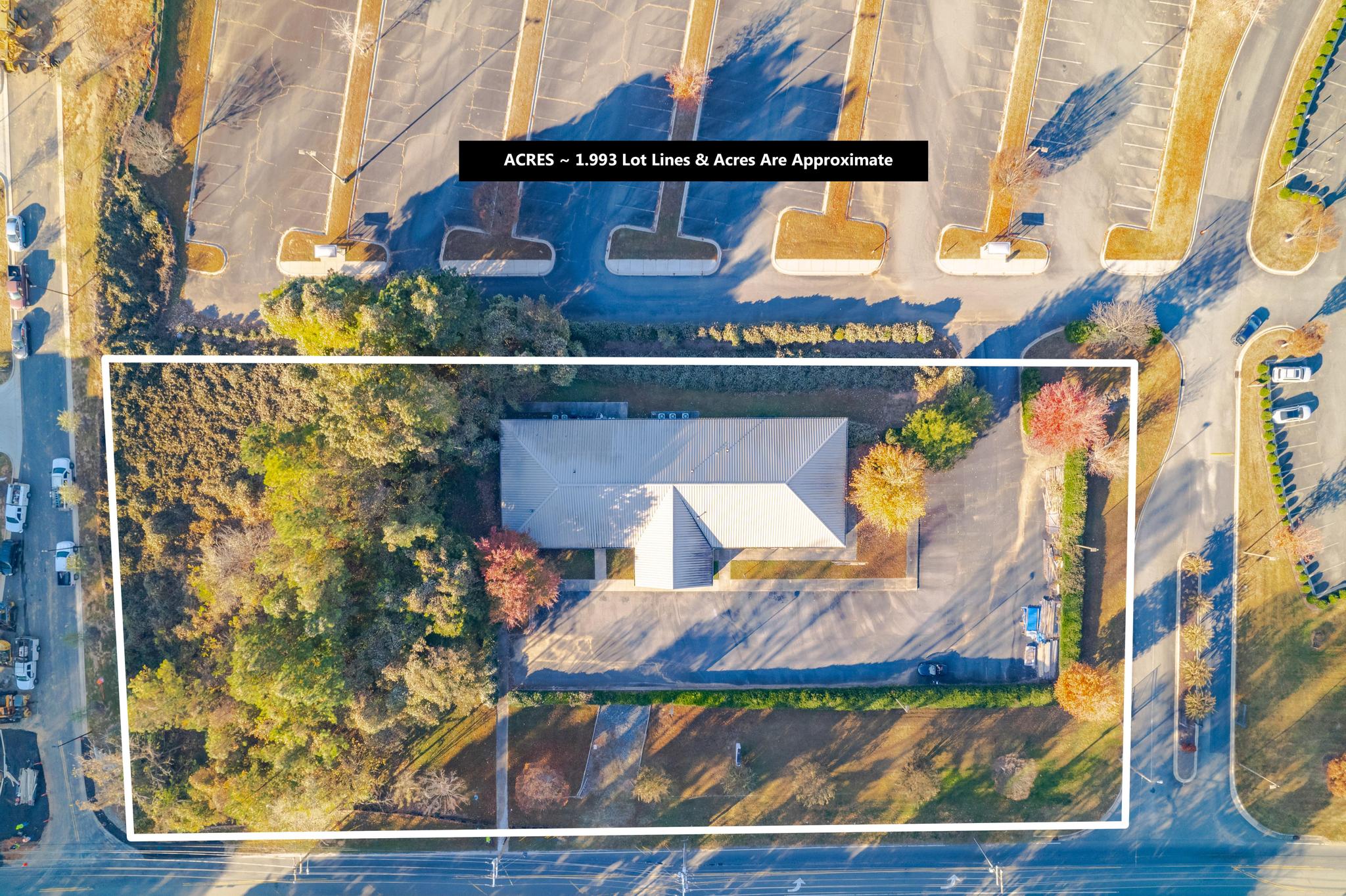 Overhead Drone View of one story Medical Office building with parking lot