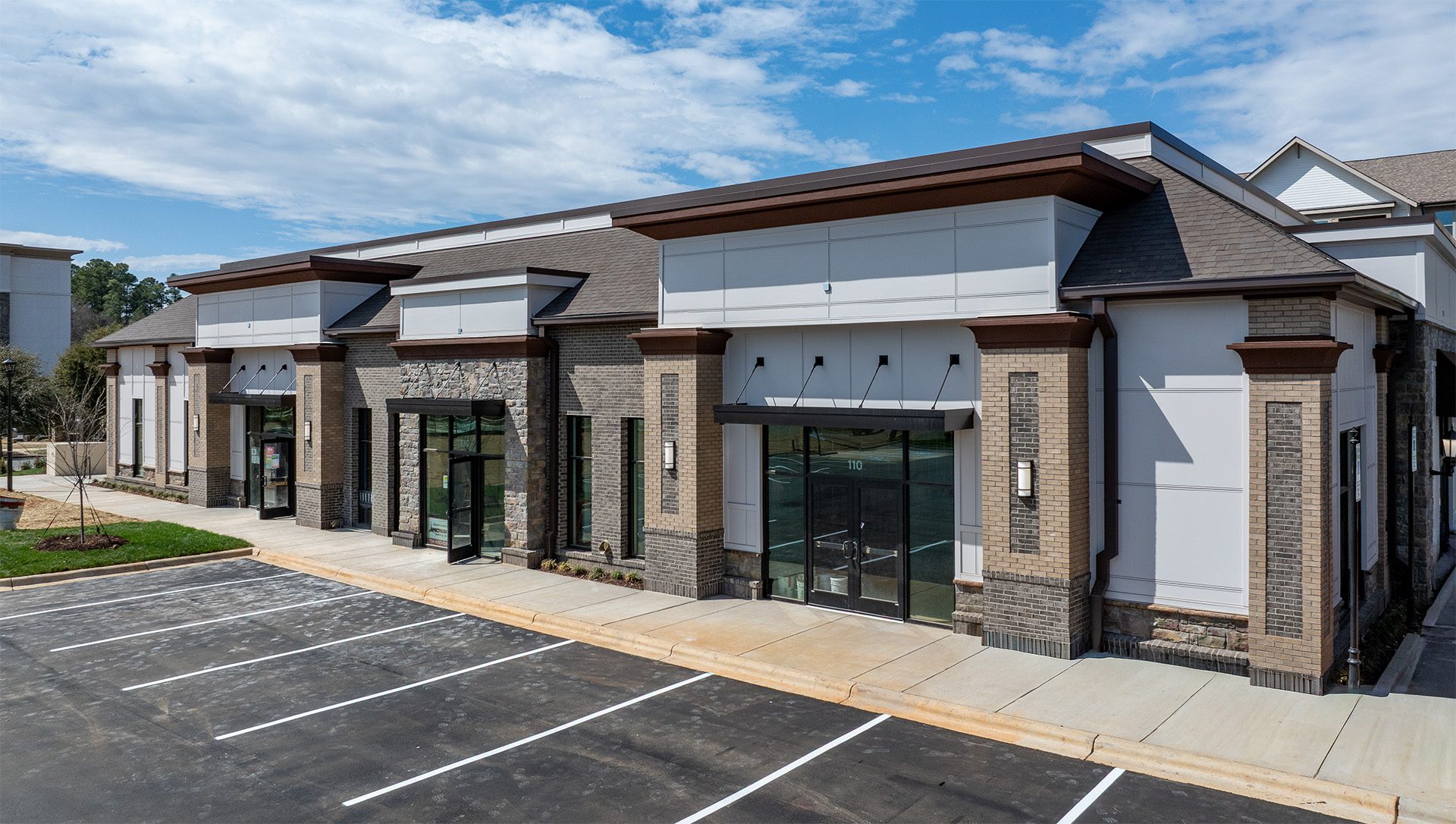 building 1 at Berewick Town Center exterior image of commercial 1-story multi-tenant building