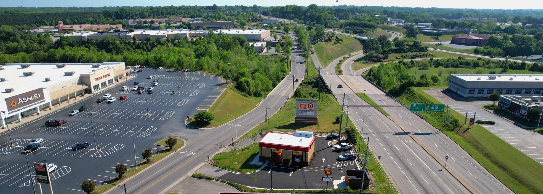Aerial view of parking lot, main road and outlined Take 5