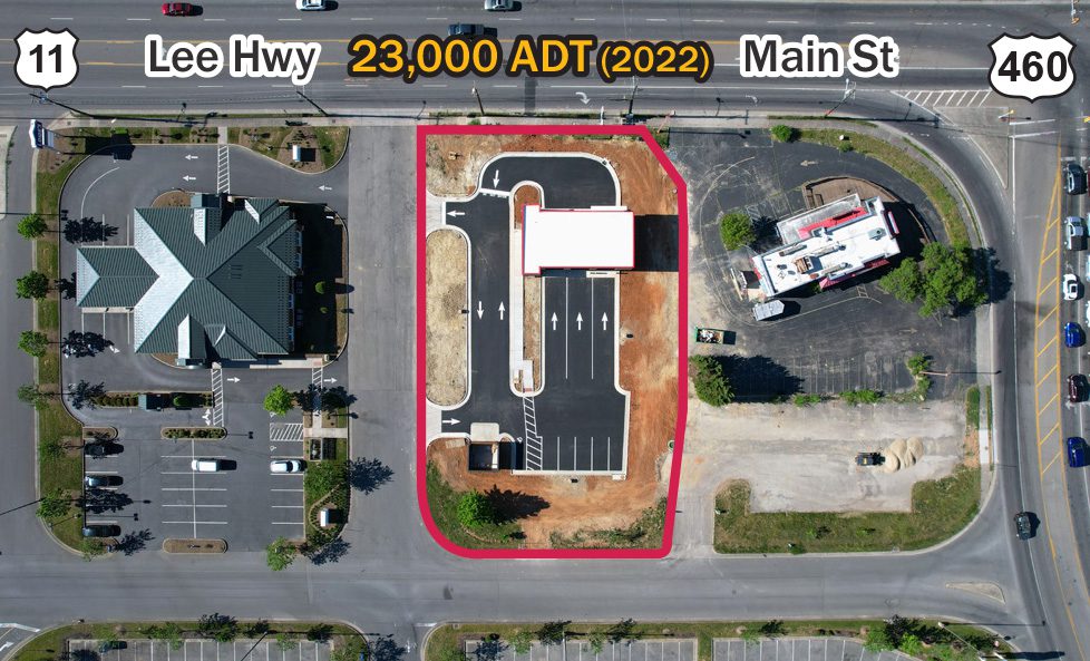 Aerial view of parking lot, main road and outlined Take 5