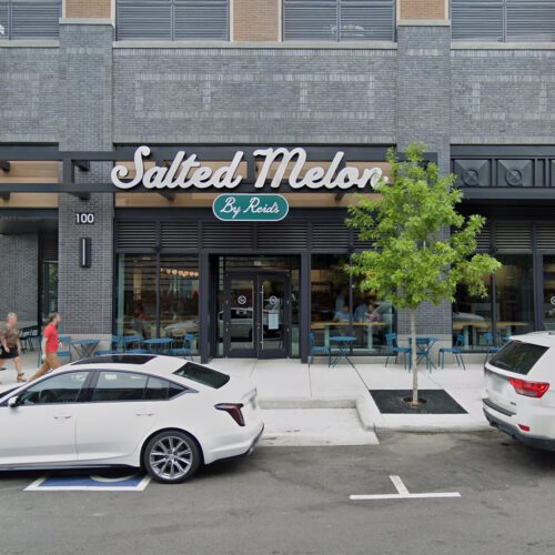 Salted Melon in South End exterior with cars parked in front and people approaching restaurant