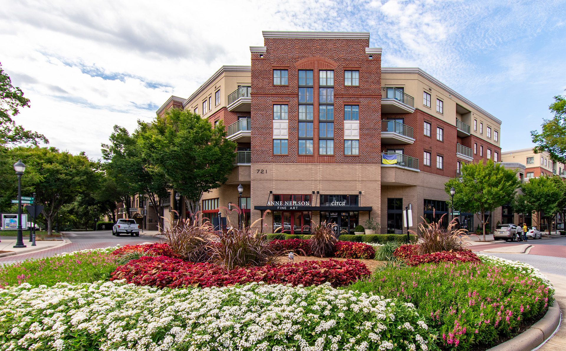 Morrison POA image of multi-family with retail on bottom level of a brick building