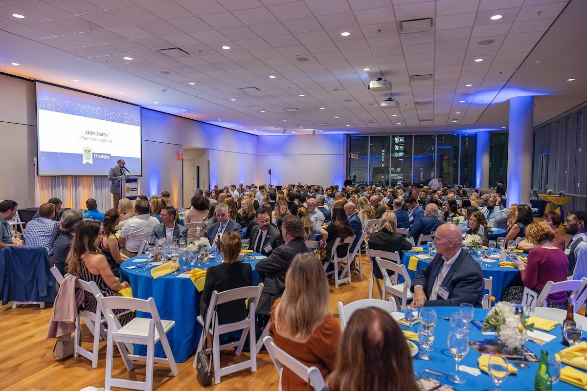 Charlotte Magazine Top Workplaces event room filled with people at tables