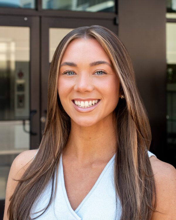 Madison Mendyk young woman smiling with brunette hair