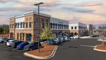 Brick Multi Tenant 2 story Building with parking lot
