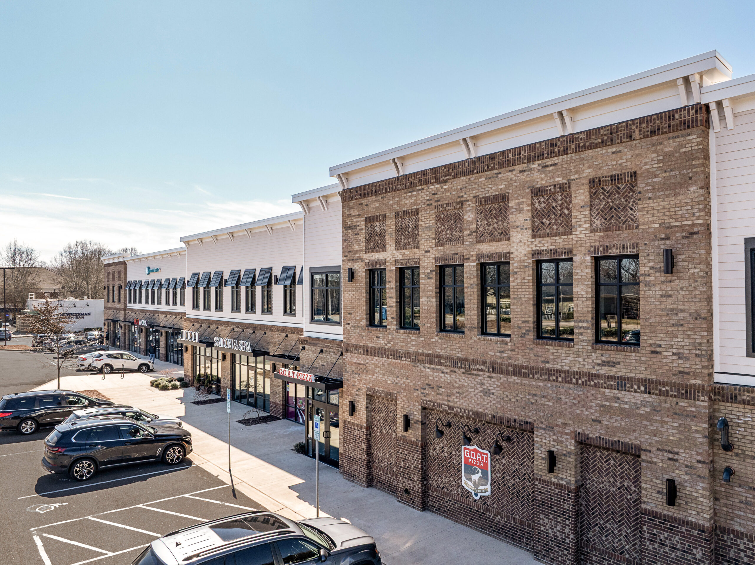 Brick Multi Tenant 2 story Building with parking lot