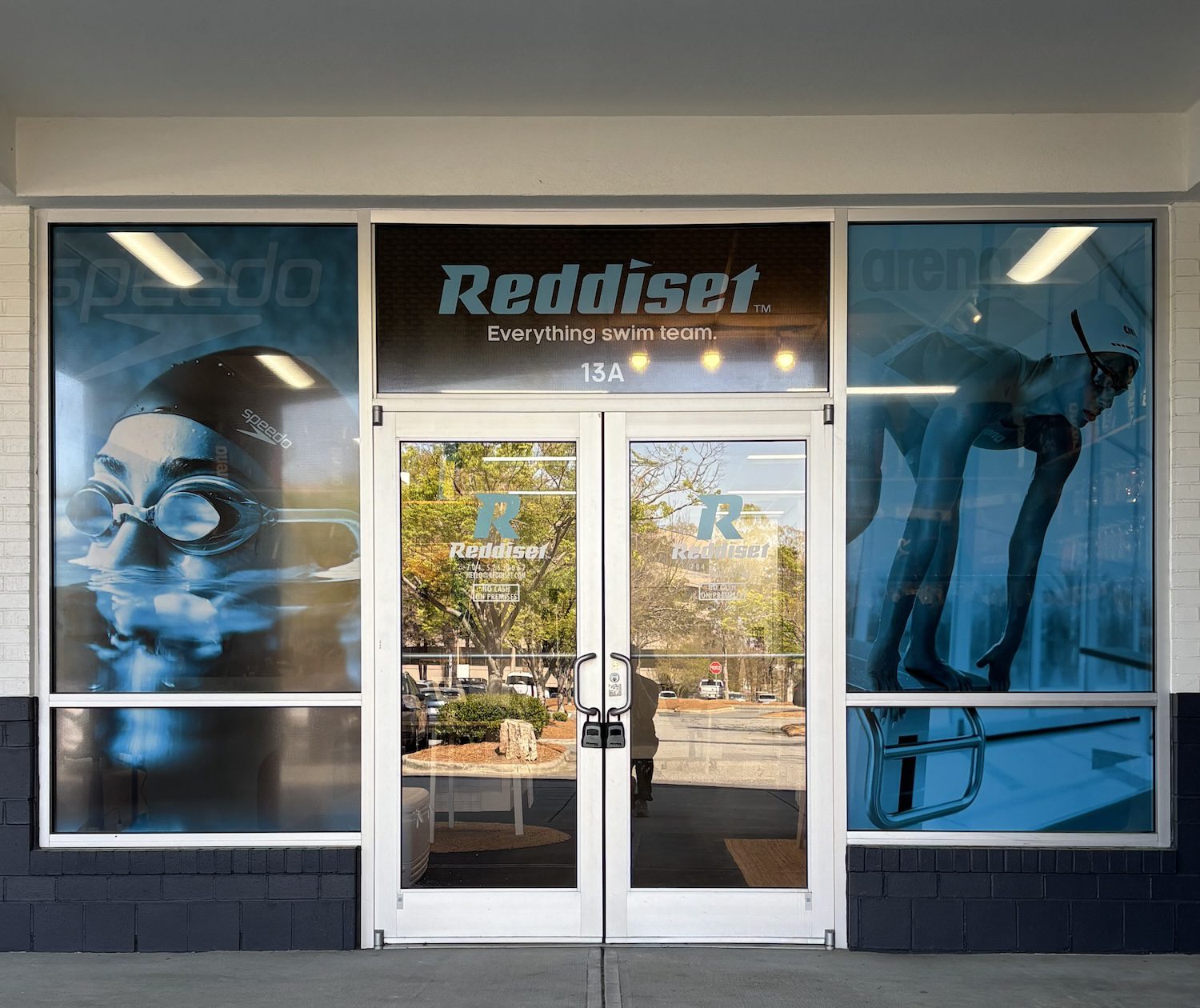 Reddiset swim store front doors