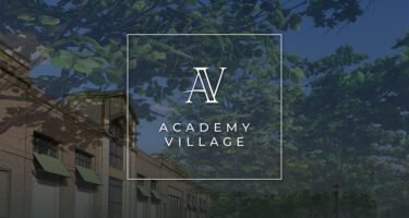 Academy Village logo over rendering