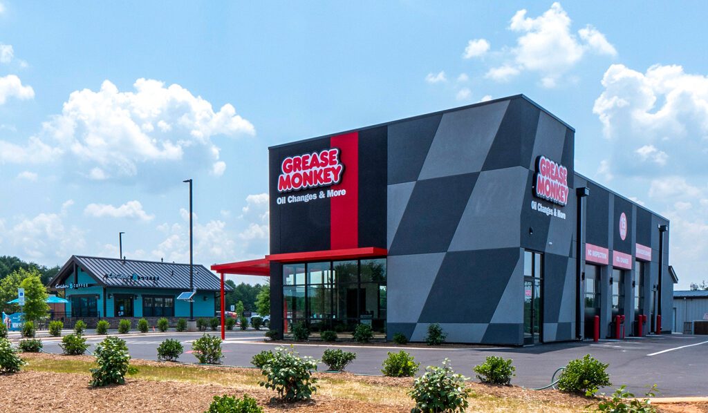 Grease Monkey-Red and gray building exterior