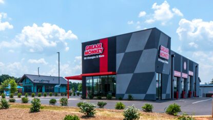 Grease Monkey-Red and gray building exterior
