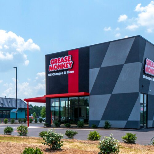 Grease Monkey-Red and gray building exterior