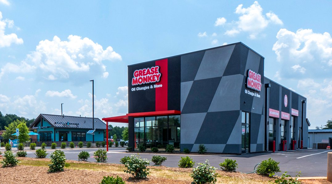 Grease Monkey-Red and gray building exterior