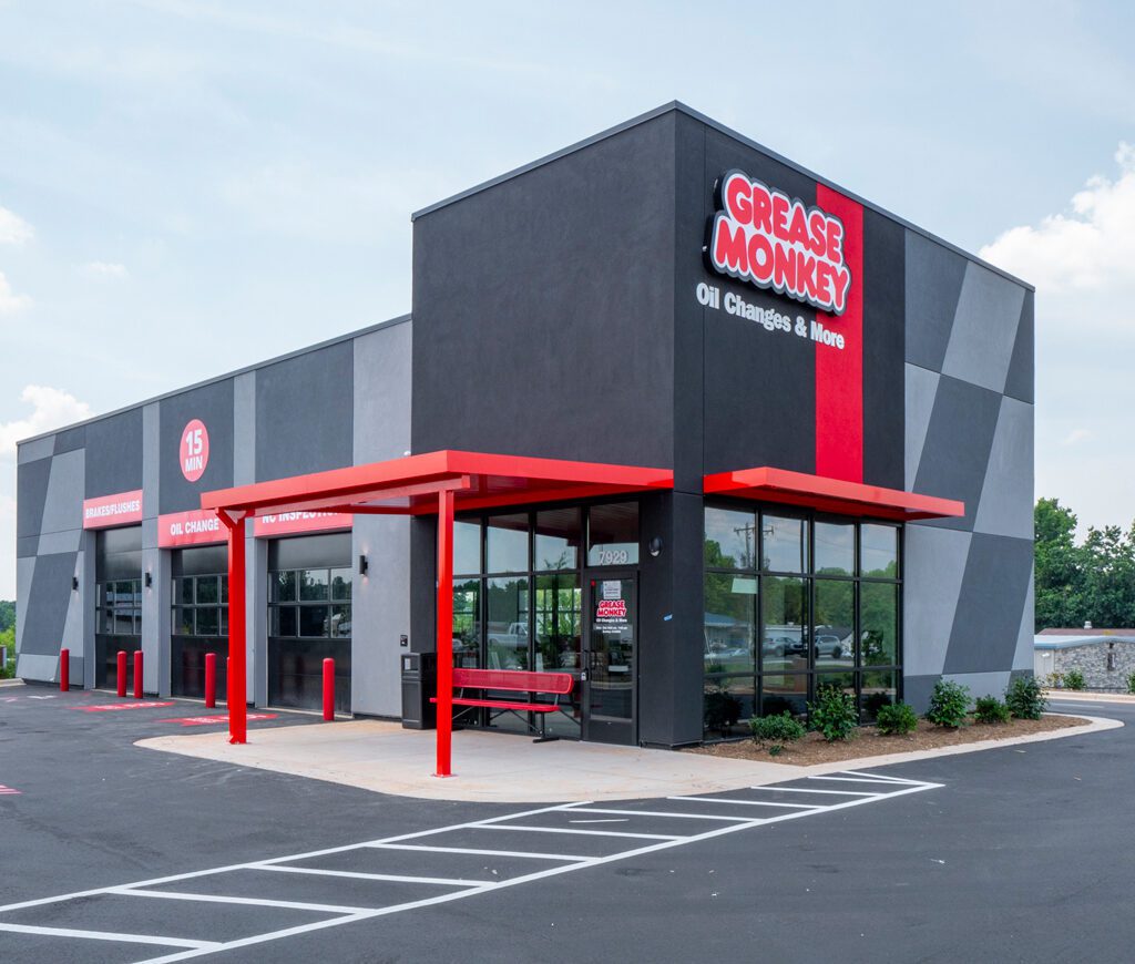 Grease Monkey-Red and gray building exterior