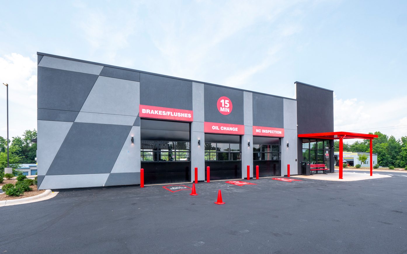Grease Monkey-Red and gray building exterior