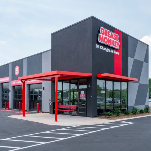 Grease Monkey-Red and gray building exterior