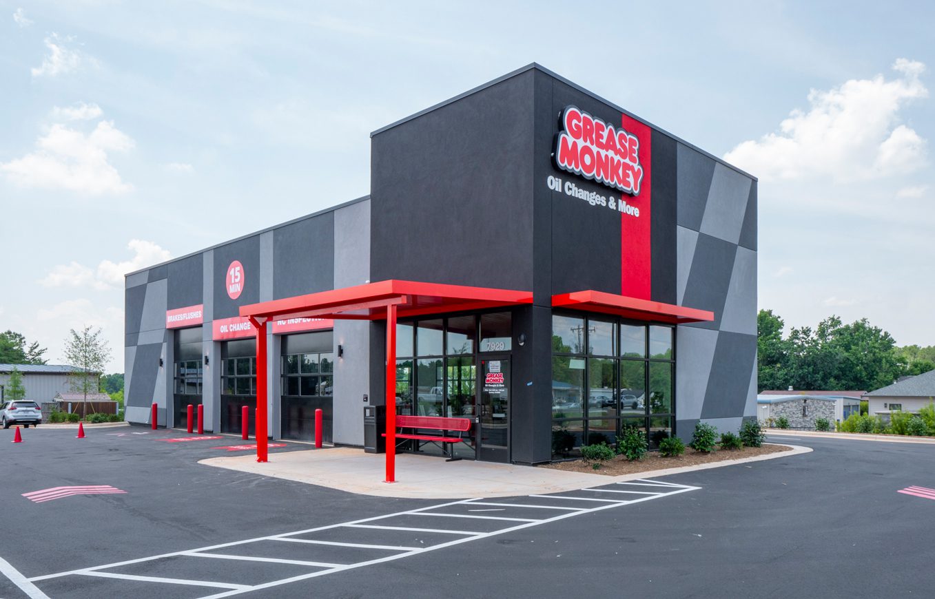 Grease Monkey-Red and gray building exterior