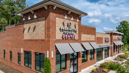 Carrington Square multi-tenant retail building with brick facade