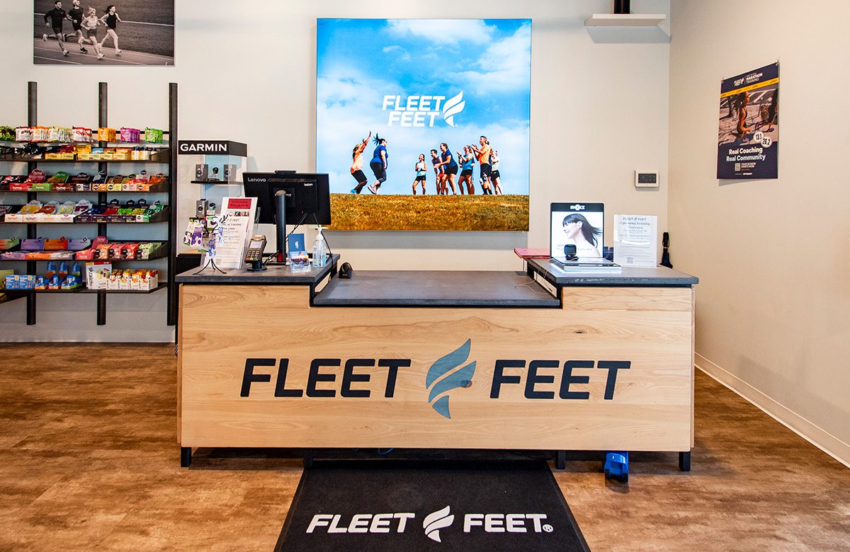 Fleet Feet checkout counter inside Concord location