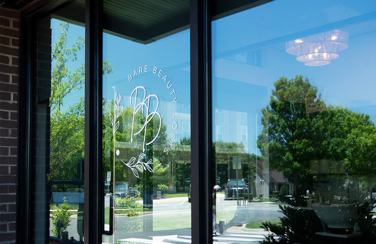 window with salon logo from My Salon Suite in Concord, NC